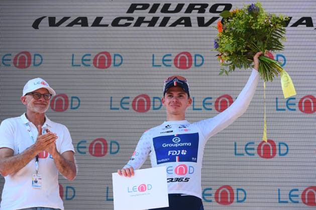 Tour de Suisse 2025 Stage 4 PIURO VALCHIAVENNA, ITALY - JUNE 18 : Gregoire Romain (FRA) of Groupama - FDJ during the podium ceremony after the stage 4 of the 88th edition of Tour de Suisse an UCI World Tour 2.UWT cycling road race stage for Men Elite of 193.2 km with start in Heiden and finish in Piuro Valchiavenna on June 18, 2025 in Piuro Valchiavenna, Italy, 18 06 2025 ( Motordriver Kenny Verfaillie - Piuro Valchiavenna Italy  Copyright: xVincentxKalutx