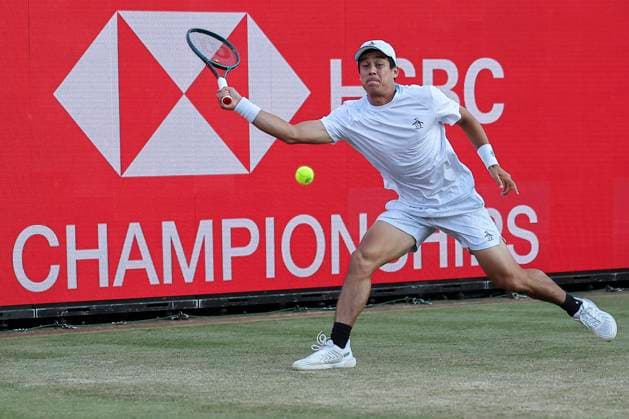 18th June 2025; HSBC Championships, Queens Club, West Kensington, London, England: HSBC Mens Championships Queens Club, Day 3; Mackenzie McDonald (USA) plays a forehand shot against Holger Rune (DEN)  ActionPlus12802413 HenningxVonxJagow