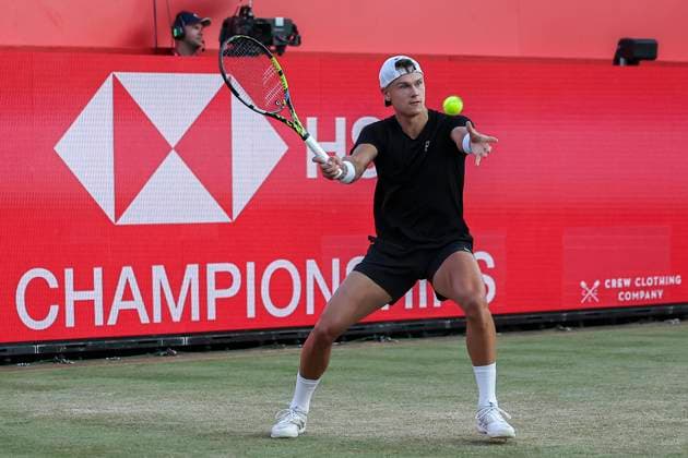 18th June 2025; HSBC Championships, Queens Club, West Kensington, London, England: HSBC Mens Championships Queens Club, Day 3; Holger Rune (DEN) plays a forehand shot against Mackenzie McDonald (USA)  ActionPlus12802417 HenningxVonxJagow