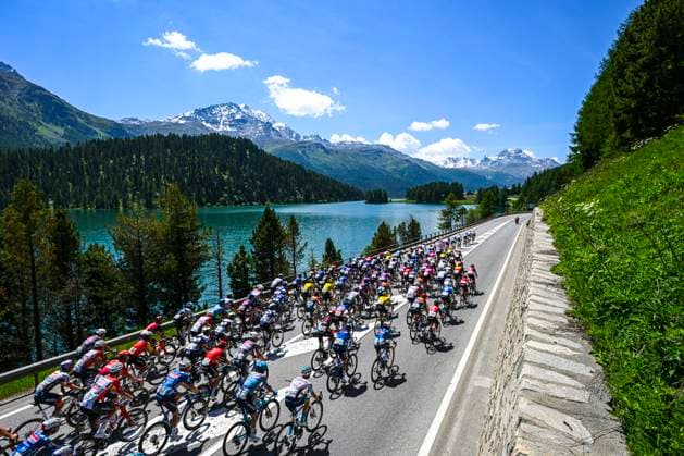 Tour de Suisse 2025 Stage 5 SANTA MARIA IN CALANCA, SWITZERLAND - JUNE 19 : Illustration picture of the peloton during stage 5 of the 88th edition of Tour de Suisse an UCI World Tour 2.UWT cycling road race stage for Men Elite of 183.6 km with start in La Punt and finish in Santa Maria in Calanca on June 19, 2025 in Santa Maria in Calanca, Switzerland, 19 06 2025 ( Motordriver Kenny Verfaillie - Santa Maria in Calanca Switzerland  Copyright: xVincentxKalutx
