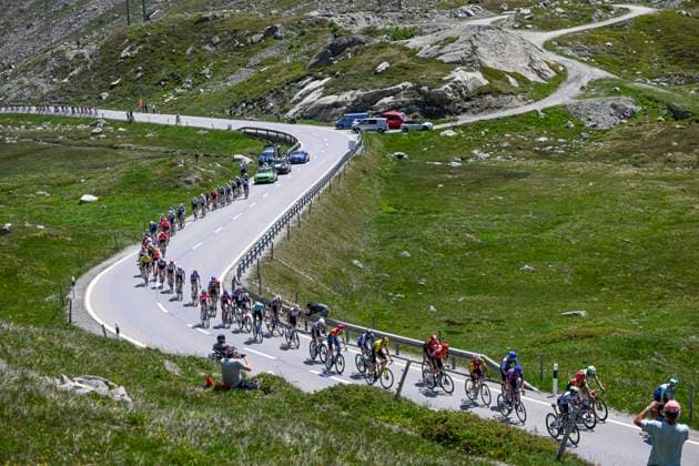 Tour de Suisse 2025 Stage 5 SANTA MARIA IN CALANCA, SWITZERLAND - JUNE 19 : Illustration picture peloton during stage 5 of the 88th edition of Tour de Suisse an UCI World Tour 2.UWT cycling road race stage for Men Elite of 183.6 km with start in La Punt and finish in Santa Maria in Calanca on June 19, 2025 in Santa Maria in Calanca, Switzerland, 19 06 2025 ( Motordriver Kenny Verfaillie - Santa Maria in Calanca Switzerland  Copyright: xVincentxKalutx