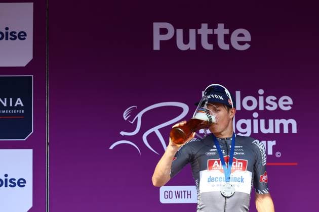 Belgian Jasper Philipsen of Alpecin-Deceuninck celebrates on the podium after winning the second stage of the Baloise Belgium Tour cycling race, 194,6 km from Beringen to Putte, Thursday 19 June 2025. The Baloise Belgium Tour takes place from 18 to 22 June. DAVIDxPINTENS  x127395459x