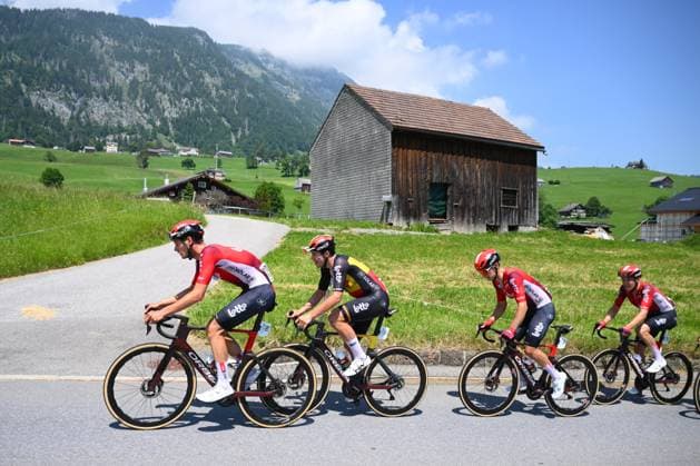 Tour de Suisse 2025 Stage 6 NEUHAUSEN AM RHEINFALL, SWITZERLAND - JUNE 20 : De Lie Arnaud (BEL) of Lotto and his teamates during stage 6 of the 88th edition of Tour de Suisse an UCI World Tour 2.UWT cycling road race stage for Men Elite of 186.7 km with start in Chur and finish in Neuhausen am Rheinfall on June 20, 2025 in Neuhausen am Rheinfall, Switzerland, 20 06 2025 ( Motordriver Kenny Verfaillie - Neuhausen am Rheinfall Switzerland  Copyright: xVincentxKalutx