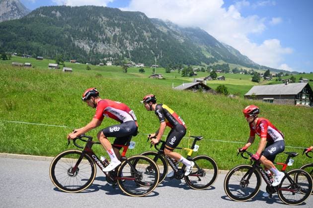 Tour de Suisse 2025 Stage 6 NEUHAUSEN AM RHEINFALL, SWITZERLAND - JUNE 20 : De Lie Axel (BEL) of Lotto Cycling Team Development, Van Moer Brent (BEL) of Lotto and Grignard Sebastien (BEL) of Lotto during stage 6 of the 88th edition of Tour de Suisse an UCI World Tour 2.UWT cycling road race stage for Men Elite of 186.7 km with start in Chur and finish in Neuhausen am Rheinfall on June 20, 2025 in Neuhausen am Rheinfall, Switzerland, 20 06 2025 ( Motordriver Kenny Verfaillie - Neuhausen am Rheinfall Switzerland  Copyright: xVincentxKalutx
