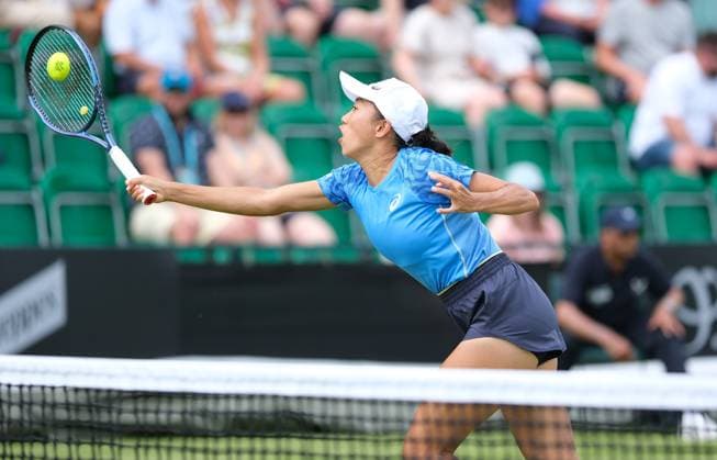 21st June 2025; Lexus Nottingham Tennis Centre, Nottingham, England; Lexus Nottingham Open, Day 6; Shuai Zhang hits a volley at the net in her doubles match against Anna Danilina and Ena Shibahara  ActionPlus12803445 PaulxBonser