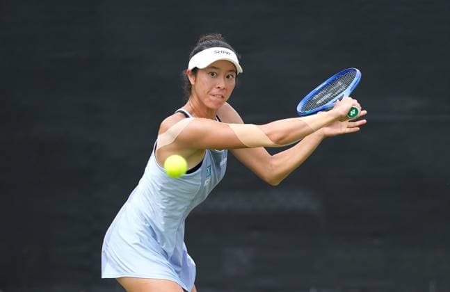 21st June 2025; Lexus Nottingham Tennis Centre, Nottingham, England; Lexus Nottingham Open, Day 6; Ena Shibahara plays a backhand shot to Shuai Zhang in their doubles semi final match  ActionPlus12803448 PaulxBonser