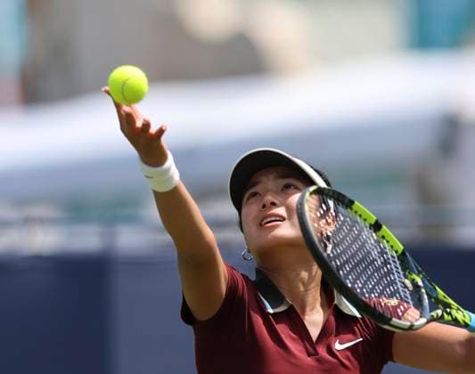 22nd June 2025; Devonshire Park, Eastbourne, East Sussex, England: Lexus International Eastbourne, Qualifying Day 2; Alexandra Eala (PHI) serves to Hailey Baptiste (USA)  ActionPlus12804211 HongboxChen