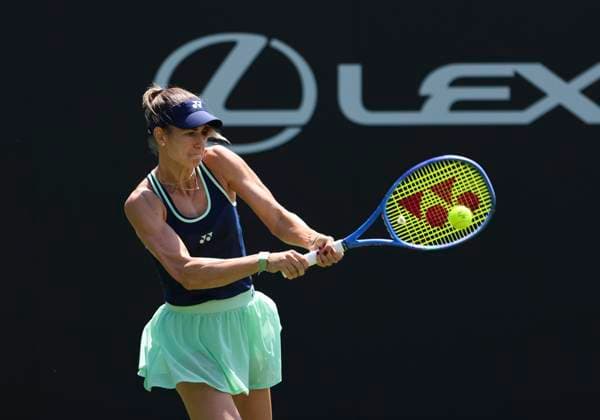 22nd June 2025; Devonshire Park, Eastbourne, East Sussex, England: Lexus International Eastbourne, Qualifying Day 2; Anna Bondar (HUN) plays a backhand shot Kimberly Birrell (AUS)  ActionPlus12804220 HongboxChen