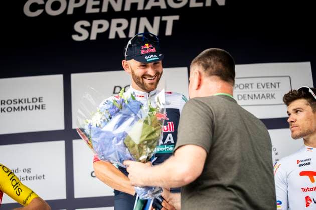 Cycling: World Tour Race Copenhagen Sprint Winner Jordi Meeus (Red Bull - Bora - Hansgrohe) on the podium after the men s World Tour race Copenhagen from Roskilde to Copenhagen on Sunday, June 22, 2025.. (Photo: Ida Marie Odgaard Ritzau Scanpix) , Copenhagen Denmark Copyright: RitzauxScanpix IdaxMariexOdgaardx spdk20250622-175207-L