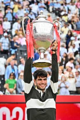 22nd June 2025; HSBC Championships, Queens Club, West Kensington, London, England: HSBC Mens Championships Queens Club, Day 7; Carlos Alcaraz (ESP) celebrates winning the final against Jiri Lehecka (CZE) and poses with the Queen s Cup Gentlemen s Open Singles trophy  ActionPlus12804259 GodfreyxPitt