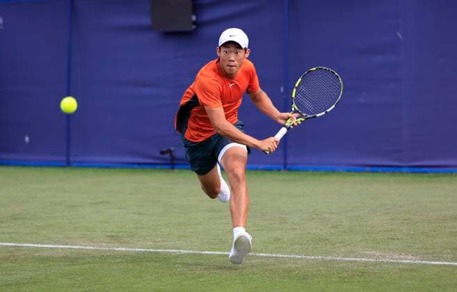 22nd June 2025; Devonshire Park, Eastbourne, East Sussex, England: Lexus International Eastbourne, Qualifying Day 2; Chun-Hsin Tseng (TPE) plays a backhand shot against Mattia Bellucci (ITA)  ActionPlus12804341 HongboxChen
