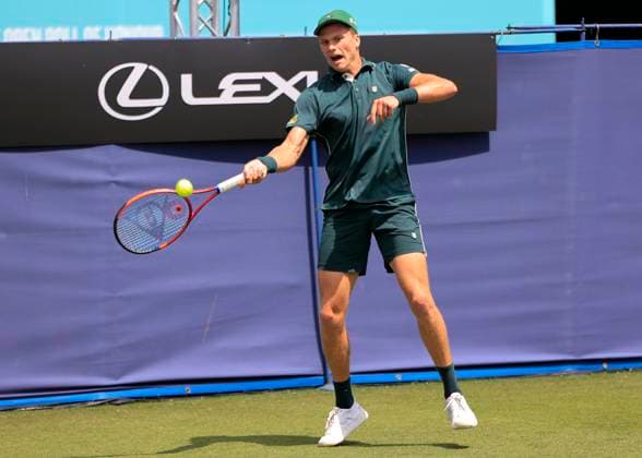 22nd June 2025; Devonshire Park, Eastbourne, East Sussex, England: Lexus International Eastbourne, Qualifying Day 2; Jenson Brooksby (USA) plays a forehand against Aleksandar Vukic (AUS)  ActionPlus12804298 HongboxChen