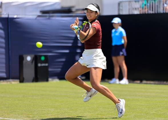 22nd June 2025; Devonshire Park, Eastbourne, East Sussex, England: Lexus International Eastbourne, Qualifying Day 2; Alexandra Eala (PHI) plays a forehand shot against Hailey Baptiste (USA)  ActionPlus12804307 HongboxChen
