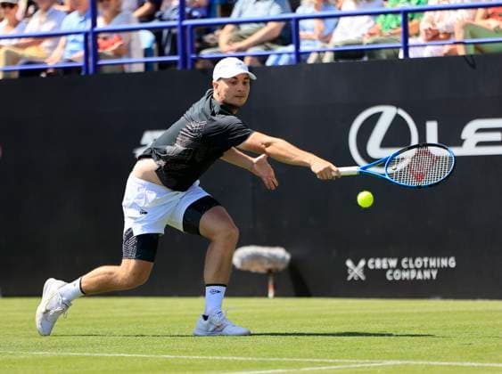 23rd June 2025; Devonshire Park, Eastbourne, East Sussex, England; Lexus International Eastbourne, Day 1; Miomir Kecmanovic (SRB) plays a backhand shot against Daniel Evans (GBR)  ActionPlus12804777 HongboxChen