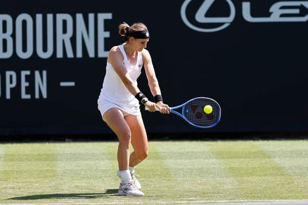23rd June 2025; Devonshire Park, Eastbourne, East Sussex, England; Lexus International Eastbourne, Day 1; Greet Minnen (BEL) plays a backhand shot against Francesca Jones (GBR)  ActionPlus12804798 HongboxChen