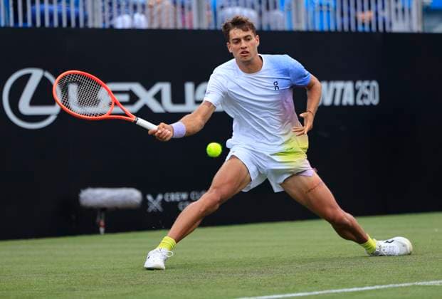 24th June 2025; Devonshire Park, Eastbourne, East Sussex, England; Lexus International Eastbourne, Day 2; Flavio Cobolli (ITA) plays a forehand shot against Jacob Fearnley (GBR)  ActionPlus12805250 HongboxChen