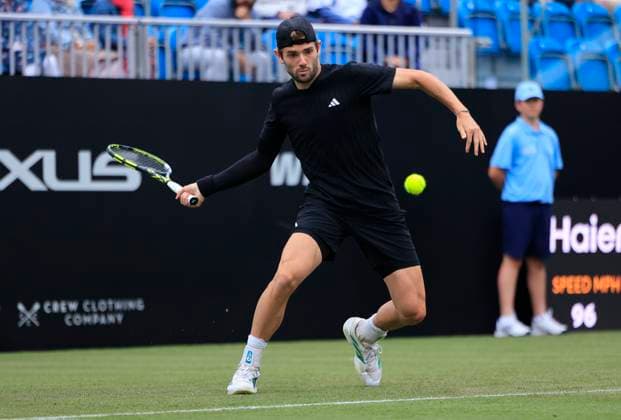24th June 2025; Devonshire Park, Eastbourne, East Sussex, England; Lexus International Eastbourne, Day 2; Jacob Fearnley (GBR) plays a forehand shot against Flavio Cobolli (ITA)  ActionPlus12805321 HongboxChen