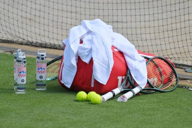 Wimbledon Tennis Championships - Practice Day LONDON, UNITED KINGDOM - JUNE 25: A tennis platers racquets and kit on the grass practice courts at The All England, All England Lawn Tennis and Croquet Club ahead of the Wimbledon tennis championships in London, United Kingdom on June 25, 2025. Ray Tang Anadolu London United Kingdom. Editorial use only. Please get in touch for any other usage.  Copyright: x2025xAnadoluxRayxTangx