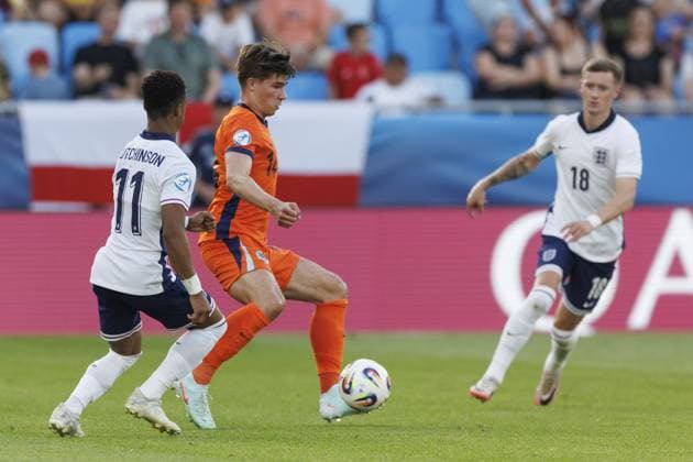 BRATISLAVA , 25-06-2025 , Football stadium Tehelne pole. Narodny football stadium , UEFA U21, U 21 Euro2025 , semi-finals , England U21 - Netherlands U21.(L-R) England U21 player Omari Hutchinson, Netherlands U21 player Wouter Goes England U21 - Netherlands U21  x29893684x Copyright: