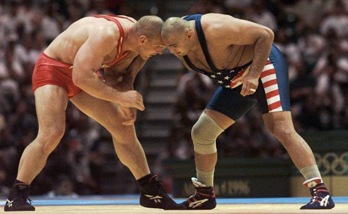 Florida News - January 31, 1997 OT 2090 Deliver to: sports desk 7 23 96 - atlanta - Going head to head, (L-R) Alexander Karelin (CQ) and Matt Ghaffari Copyright: xStxPetersburgxTimesx