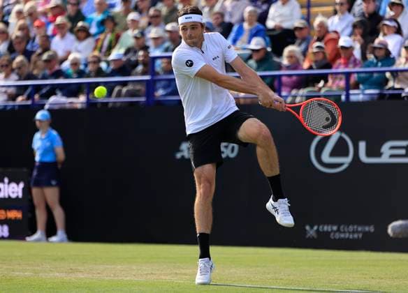 26th June 2025; Devonshire Park, Eastbourne, East Sussex, England; Lexus International Eastbourne, Day 4; Taylor Fritz (USA) plays a backhand shot against Marcos Giron (USA)  ActionPlus12805691 HongboxChen