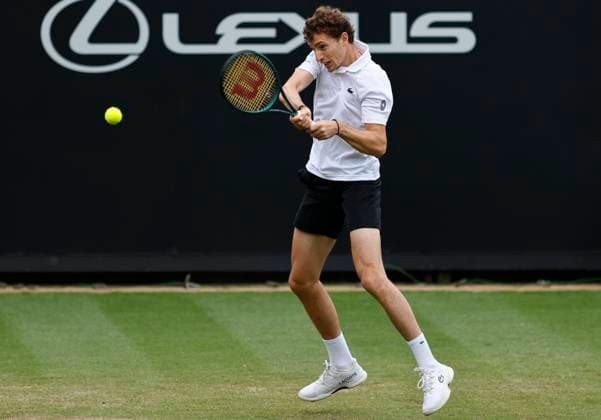 26th June 2025; Devonshire Park, Eastbourne, East Sussex, England; Lexus International Eastbourne, Day 4; Ugo Humbert (FRA) plays a backhand shot against Billy Harris (GBR)  ActionPlus12805699 HongboxChen