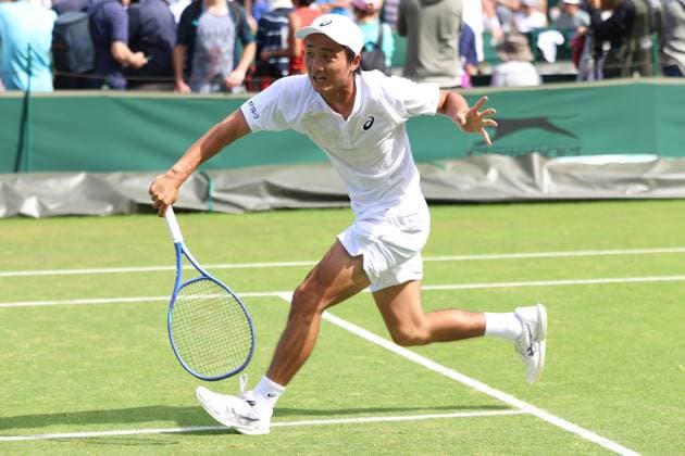 June 26, 2025, London, Celestynow, England: SHINTARO MOCHIZUKI of Japan during the match against D. Stricker of Switzerland in the third round of qualification of Championships 2025 at Wimbledon AELTC in London. London England - ZUMAc278 20250626_zsp_c278_021 Copyright: xMarcinxCholewinskix