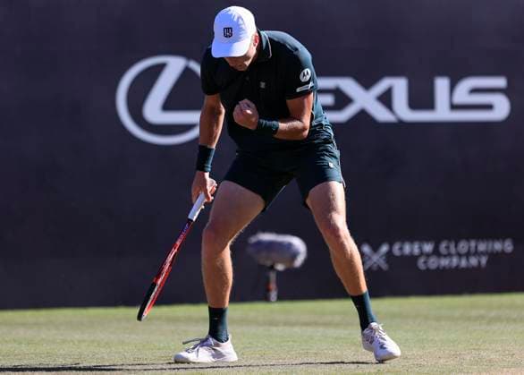 27th June 2025; Devonshire Park, Eastbourne, East Sussex, England; Lexus International Eastbourne, Day 5; Jensen Brooksby (USA) celebrates in the mens semi-finals match against Ugo Humbert (FRA)  ActionPlus12805995 HongboxChen