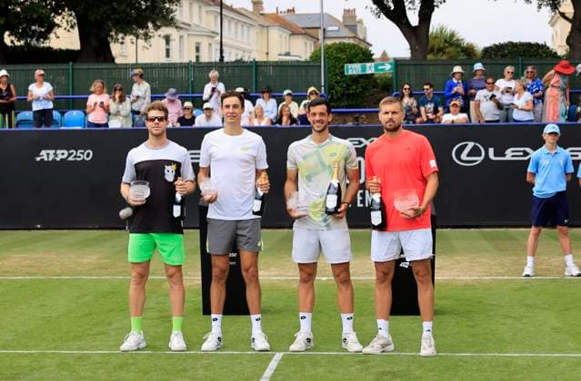 27th June 2025; Devonshire Park, Eastbourne, East Sussex, England; Lexus International Eastbourne, Day 5; The mens doubles winners Julian Cash (GBR) and Lloyd Glasspool (GBR) pose for a photo with the runner up Ariel Behar (URU) and Joran Vliegen (BEL)  ActionPlus12806098 HongboxChen