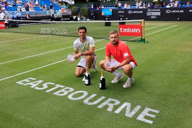 27th June 2025; Devonshire Park, Eastbourne, East Sussex, England; Lexus International Eastbourne, Day 5; Julian Cash (GBR) and Lloyd Glasspool (GBR) with their Mens Doubles Final trophies  ActionPlus12806100 HongboxChen
