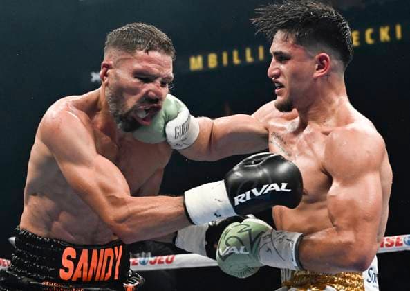 Sport Themen der Woche KW26 Sport Bilder des Tages June 27, 2025, Quebec, Pq, Canada: Christopher Guerrero, right, punches Sandy Messaoud during a welterweight fight in Quebec City on Friday, June 27, 2025. Christopher Guerrero, Sandy Messaoud  - ZUMAc35_ 20250627_zaf_c35_060 Copyright: xJacquesxBoissinotx