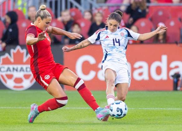 (250628) -- TORONTO, June 28, 2025 -- Shelina Zadorsky (L) of Canada vies with Priscila Chinchilla of Costa Rica during an international women s friendly match between Canada and Costa Rica in Toronto, Canada, on June 27, 2025. (Photo by Xinhua) (SP)CANADA-TORONTO-FOOTBALL-INTERNATIONAL WOMEN S FRIENDLY MATCH-CANADA VS COSTA RICA ZouxZheng 