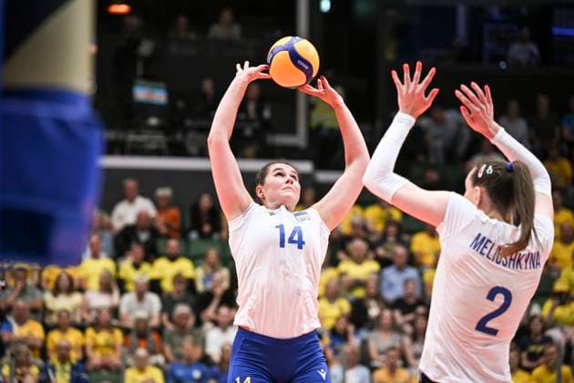 ÄNGELHOLM, SWEDEN 20250628 Ukraine s Daria Sharhorodska ( 14) and Diana Meliushkyna in action during the CEV Women s Volleyball European Golden League semifinal match between Ukraine and Sweden at Catena Arena, in Angelholm, Sweden, on June 28, 2025. ÄNGELHOLM SWEDEN x11566x