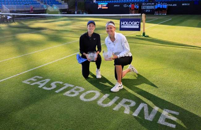 Sport Bilder des Tages 28th June 2025; Devonshire Park, Eastbourne, East Sussex, England; Lexus International Eastbourne, Day 6; Marie Bouzkova (CZE) and Anna Danilina (KAZ) with their womens doubles winners trophies  ActionPlus12806374 HongboxChen