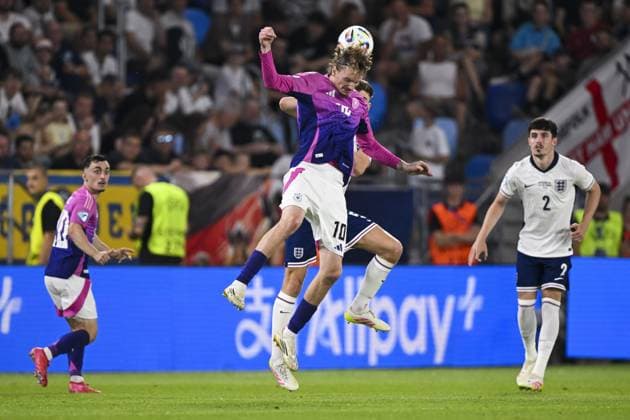 BRATISLAVA - Nick Woltemade of Germany U21, U 21 Charlie Cresswell of England U21 (l-r) at the National Football Stadium during the Under-21 European Championship, EM, Europameisterschaft final between Young England and Young Germany. ANP Hollandse Hoogte UEFA European Under-21 Championship 2025 Final 2024 25 xVIxANPxSportx xGerritxvanxKeulenxIVx 530650582 originalFilename: 530650582.jpg