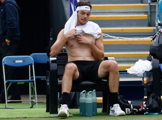 28th June 2025; Devonshire Park, Eastbourne, East Sussex, England; Lexus International Eastbourne, Day 6; Taylor Fritz (USA) changes his shirt in the match against Jensen Brooksby (USA) in the mens singles final  ActionPlus12806429 HongboxChen