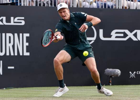 28th June 2025; Devonshire Park, Eastbourne, East Sussex, England; Lexus International Eastbourne, Day 6; Jensen Brooksby (USA) plays a forehand shot against Taylor Fritz (USA) in the mens singles final match  ActionPlus12806432 HongboxChen