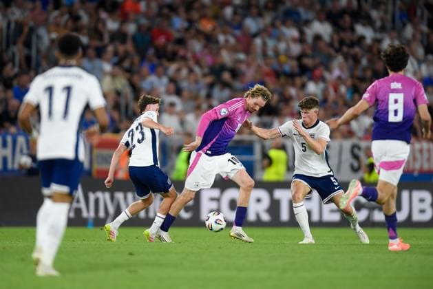 Nick Woltemade of Germany surrounded by Charlie Cresswell of England U21, U 21 and Tyler Morton of England U21 England U21 v Netherlands U21, UEFA U21 Championship, Final, National Football Stadium, Bratislava, Slovakia - 28 Jun 2025Bratislava National Football Stadium Slovakia  Copyright: xAlexxNicodim Shutterstockx 15377260ea