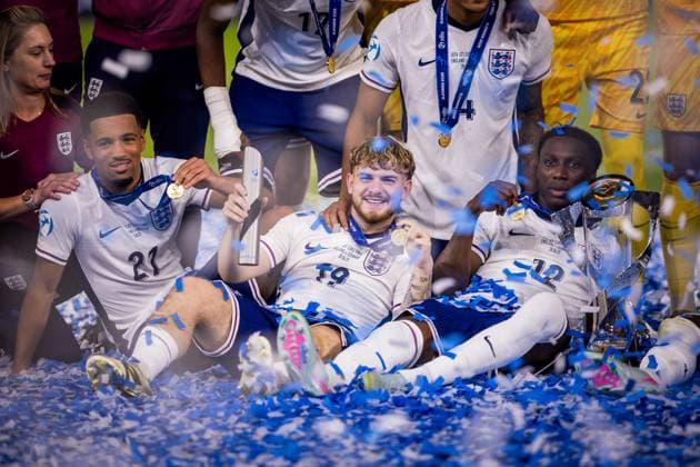 ENGLAND U21, U 21 - GERMANY U21 FINAL Ethan Nwaneri, Harvey Elliott, Brooke Norton Cuffy of England celebrate with a trophy after the UEFA European Under-21 Championship 2025 Final football match between England U21 and Germany U21. National Football Stadium (Tehelene Pole), Bratislava, Slovakia, June 28, 2025. Photo by Branislav Racko Copyright: xx 080A3745