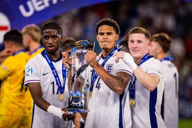 ENGLAND U21, U 21 - GERMANY U21 FINAL Jarell Quansah, Samuel Iling Jr, Jay Stansfield of England celebrate with trophy after the UEFA European Under-21 Championship 2025 Final football match between England U21 and Germany U21. National Football Stadium (Tehelene Pole), Bratislava, Slovakia, June 28, 2025. Photo by Branislav Racko Copyright: xx 080A3781