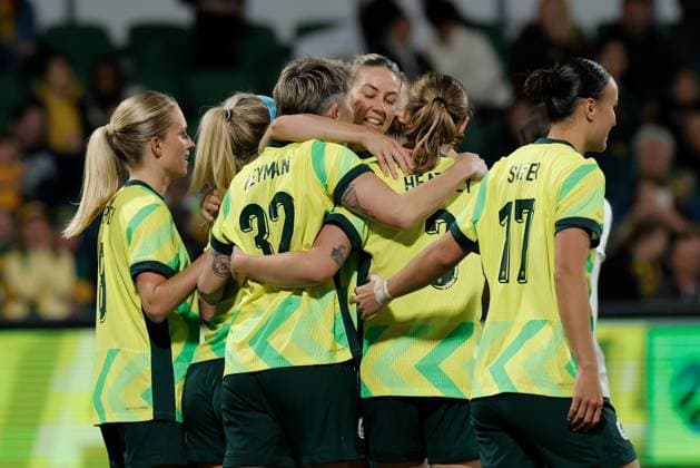 SOCCER AUSTRALIA SLOVENIA, Michelle Heyman (left) of Australia is congratulated by teammates after scoring a goal during the Women s friendly international soccer match between Australia and Slovenia at HBF Park in Perth, Sunday, June 29, 2025. ( NO ARCHIVING, EDITORIAL USE ONLY PERTH WESTERN AUSTRALIA AUSTRALIA  Copyright: xRICHARDxWAINWRIGHTx 20250629155364656451