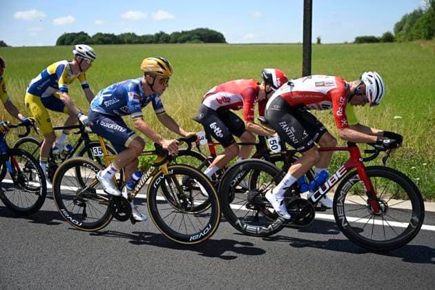 Belgian 2025 National Championship Binche 29 06 2025 BINCHE, BELGIUM - JUNE 29 : De Pooter Dries of Intermarche - Wanty, Evenepoel Remco of Soudal Quick-Step during the Men Elite cycling road race of the Belgian National Championships 2025 an UCI National Championships cycling race of 230 km with start in Binche and finish in Binche on June 29, 2025 in Binche, Belgium, 29 06 2025 Binche Belgium  Copyright: xNicoxVereeckenx