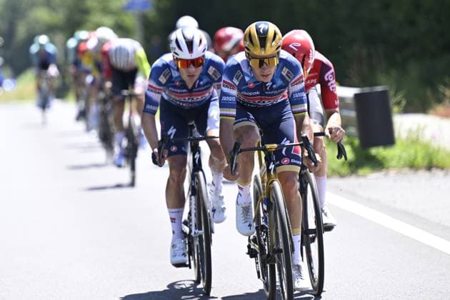 L-R, Belgian Ilan Van Wilder of Soudal Quick-Step, Belgian Remco Evenepoel of Soudal Quick-Step and Belgian Jenno Berckmoes of Lotto Cycling Team pictured in action during the men s elite road race of the Belgian Cycling Championships, 230km from and to the Grand Place square in Binche on Sunday 29 June 2025. POOLxNICOxVEREECKEN  x128058318x