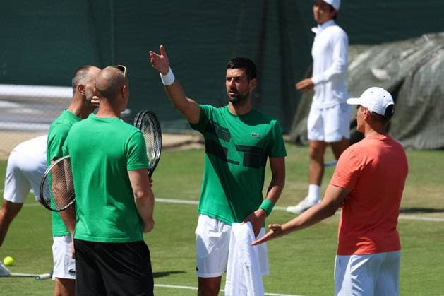 29th June 2025; All England Lawn Tennis and Croquet Club, London, England; Wimbledon Tennis Tournament, Practice Day; Seven-time Wimbledon Champion Novak Djokovic (SRB) practising on the Aorangi courts having a heated discussion with his team and new coach Dusan Vemic  ActionPlus12806767 JohnxPatrickxFletcher