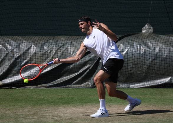 29th June 2025; All England Lawn Tennis and Croquet Club, London, England; Wimbledon Tennis Tournament, Practice Day; Taylor Fritz (USA) practising on the Aorangi courts  ActionPlus12806790 JohnxPatrickxFletcher