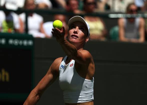 30th June 2025; All England Lawn Tennis and Croquet Club, London, England; Wimbledon Tennis Tournament, Day 1; Carson Branstine (CAN) serves to Aryna Sabalenka (BLR)  ActionPlus12807217 JohnxPatrickxFletcher