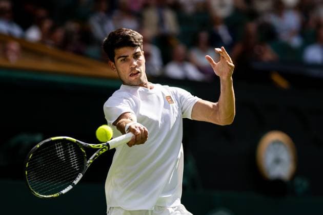 250630 Carlos Alcaraz of Spain competes in a first round singles tennis match during day 1 of Wimbledon on June 30, 2025 in London. Photo: Petter Arvidson BILDBYRAN kod PA PA1043 tennis wimbledon day 1 bbeng spanien Copyright: PETTERxARVIDSON BB250630PA011
