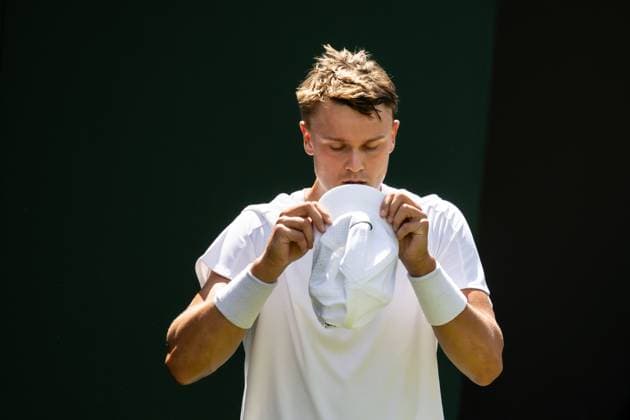 250630 Holger Rune of Denmark looks dejected when competing in a first round singles tennis match during day 1 of Wimbledon on June 30, 2025 in London. Photo: Petter Arvidson BILDBYRAN kod PA PA1043 tennis wimbledon day 1 bbeng danmark depp Copyright: PETTERxARVIDSON BB250630PA028