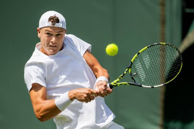 250630 Holger Rune of Denmark competes in a first round singles tennis match during day 1 of Wimbledon on June 30, 2025 in London. Photo: Petter Arvidson BILDBYRAN kod PA PA1043 tennis wimbledon day 1 bbeng danmark Copyright: PETTERxARVIDSON BB250630PA039