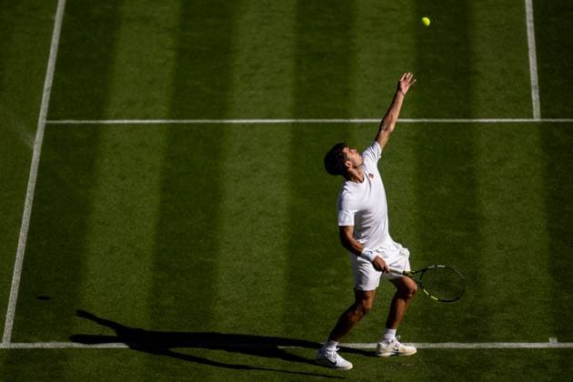 250630 Carlos Alcaraz of Spain competes in a first round singles tennis match during day 1 of Wimbledon on June 30, 2025 in London. Photo: Petter Arvidson BILDBYRAN kod PA PA1043 tennis wimbledon day 1 bbeng spanien Copyright: PETTERxARVIDSON BB250630PA059